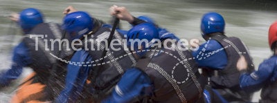 Teamwork in a rafting boat