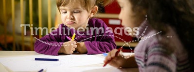 Children and fun, preschoolers drawing at school
