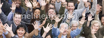 Multi Ethnic People Raising Hands Together