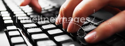 Fingers on keyboard