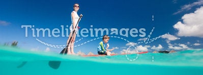 Mother and son paddling