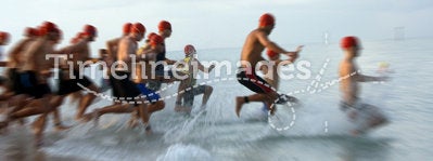 Triathlon swim race blur