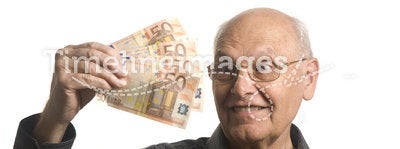 Senior man with money