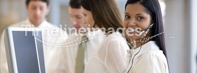 Call center with smiling woman