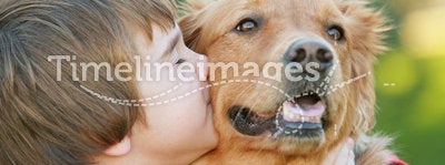 Boy Kissing Dog