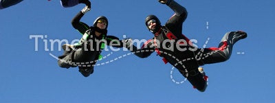 Four skydiver form a circle