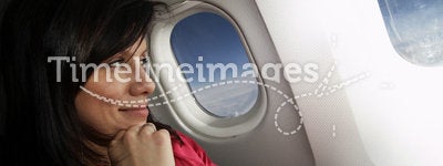 Young woman at airplane
