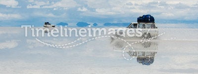 Jeep in the salt lake salar de uyuni