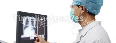 Doctor controlling X-ray computer