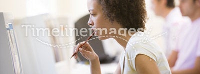 Female office worker at computer