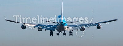 Boeing 747 airplane about to touchdown