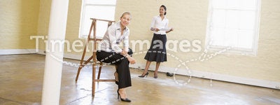 Businesswomen looking at new office space