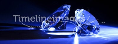 Diamonds close-up with blue ray