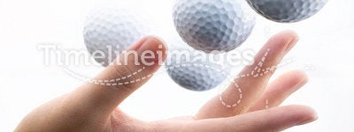 Hand with golf-ball