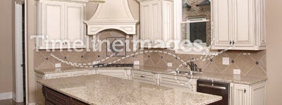 Luxury Kitchen with Granite Island and window