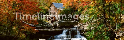 Panoramic of Glade Creek Grist Mil and autumn reflections and waterfall in Babcock State Park, WV