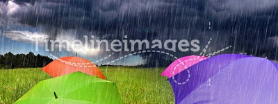 Color Umbrellas in Rainy Storm Clouds