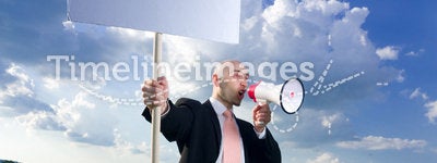 Man with sign and megaphone