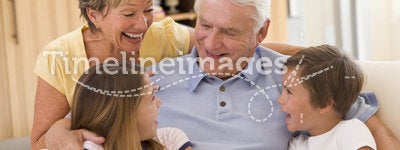 Grandparents laughing with grandchildren