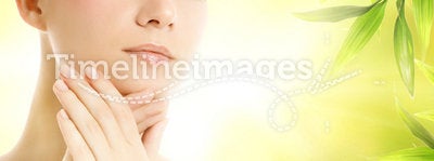 Woman applying organic cosmetics to her skin