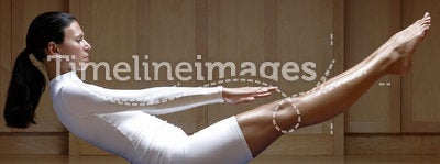 Woman in white exercising