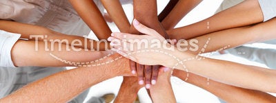 Business people-hands overlapping to show teamwork. A