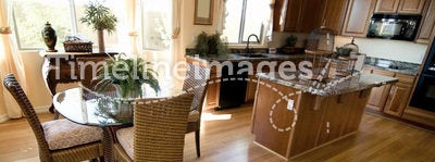 Home kitchen interior with hardwood flooring