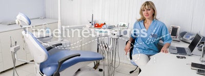 Dentist in her office