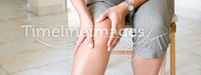 Woman suffering from knee pain