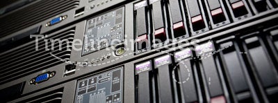 Servers stack with hard drives in a datacenter
