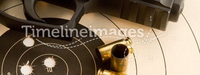 Bullseye target and gun