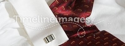 Red tie and shirt with cuff link