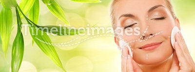Woman removing cosmetics