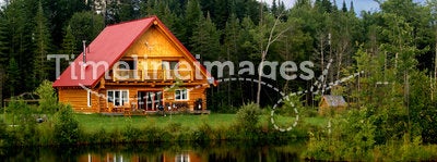 Log Cabin On A Lake