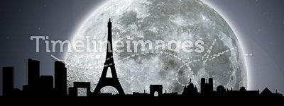 Paris skyline night with moon