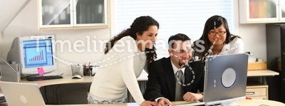 Business team looking at computer