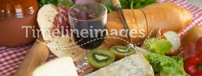Gorgonzola, parmigiano, pecorino cheese, with wine and bread