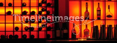 Red nightclub bar glowing bottles background
