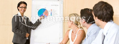 Confident business woman giving presentation
