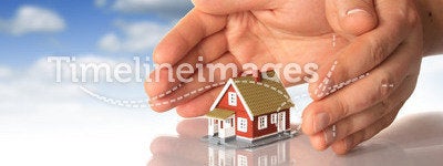 Hands and little house.