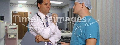 Doctor and surgeon consulting