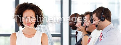 Businesswoman with folded arms in a call center