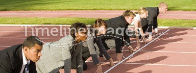 Business People Crouching at Track Starting Line